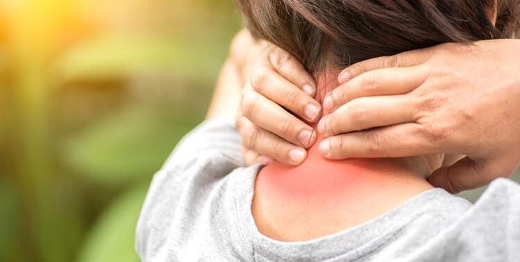 pain in the cervical spine of a woman